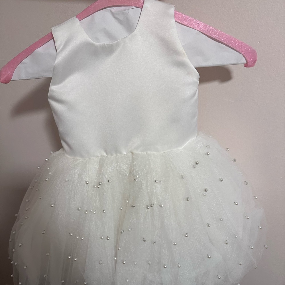 Flower girl dress/formal white dress. Size 2T, bought from  Etsy.